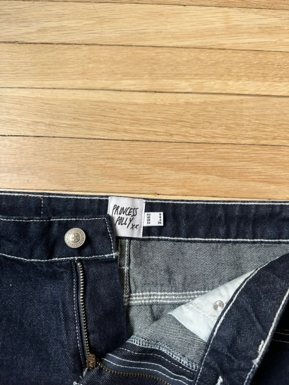 Princess Polly dark blue denim skirt